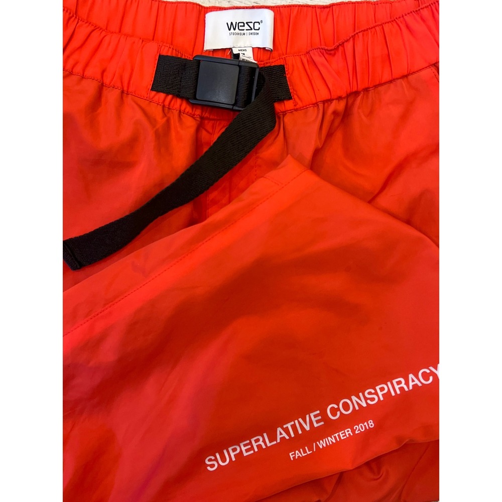 WeSC Superlative Conspiracy Orange Track Pants  Buckle Ankle Joggers L Unisex‎